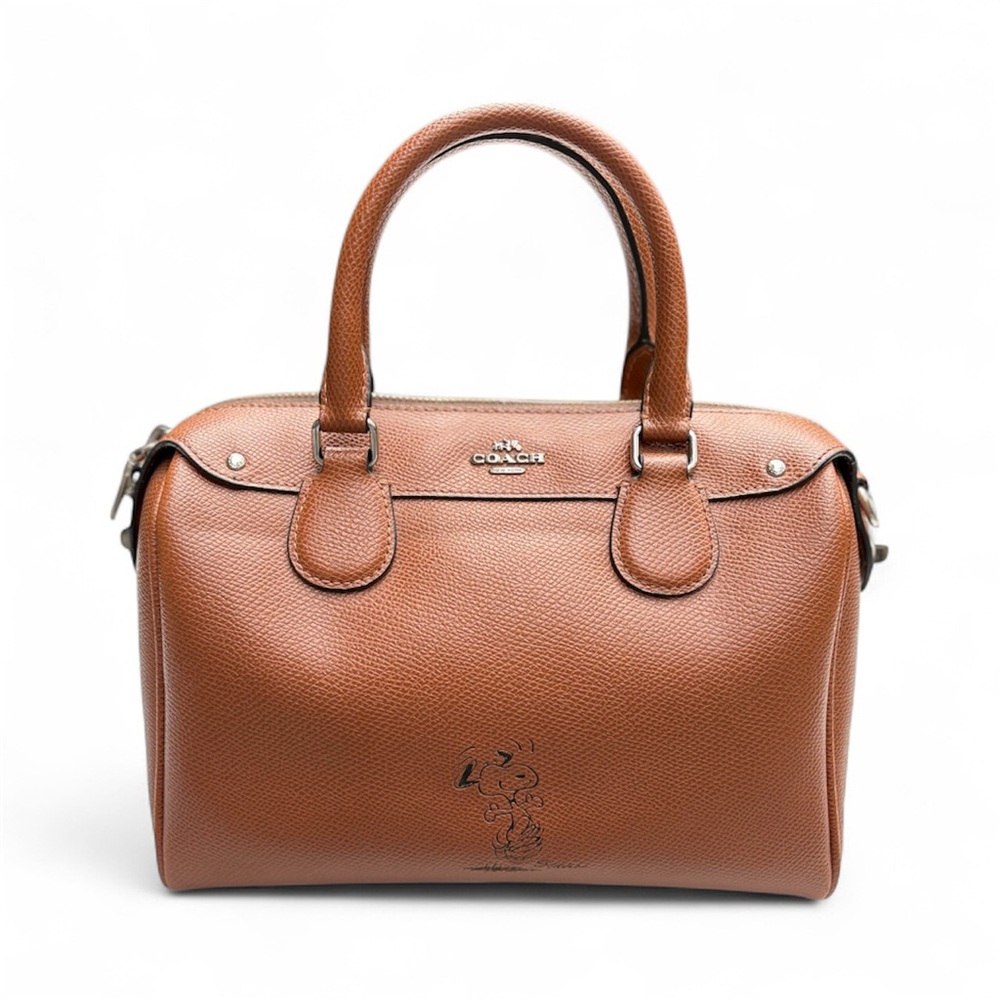 Limited Addition. Coach x Peanuts Snoopy Saddle Leather Crossbody Bag. Brown